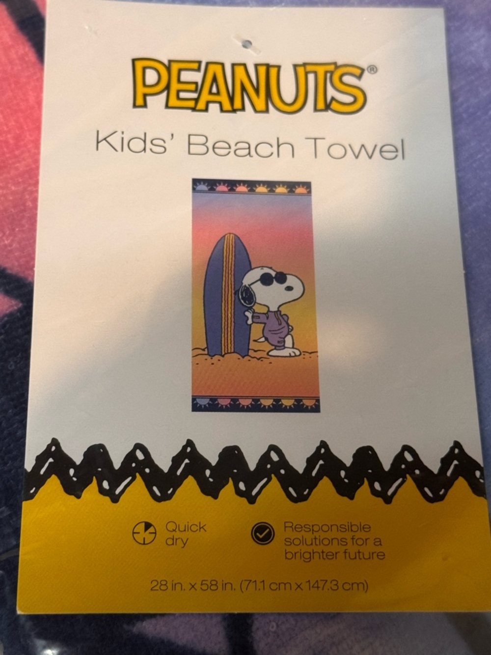Peanuts Kids Beach Towel with Snoopy Surf Graphic in Purple and Yellow 28” x 58”